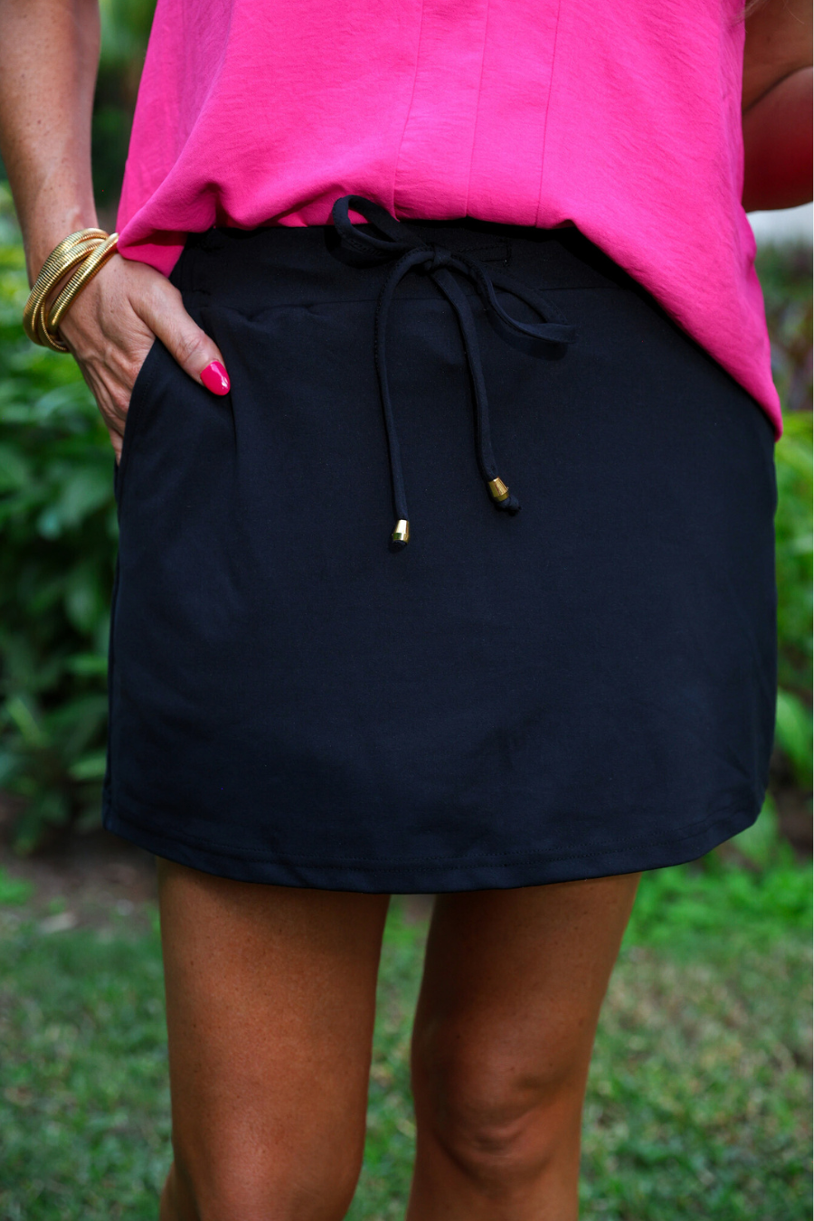 black womens skort with a pink top