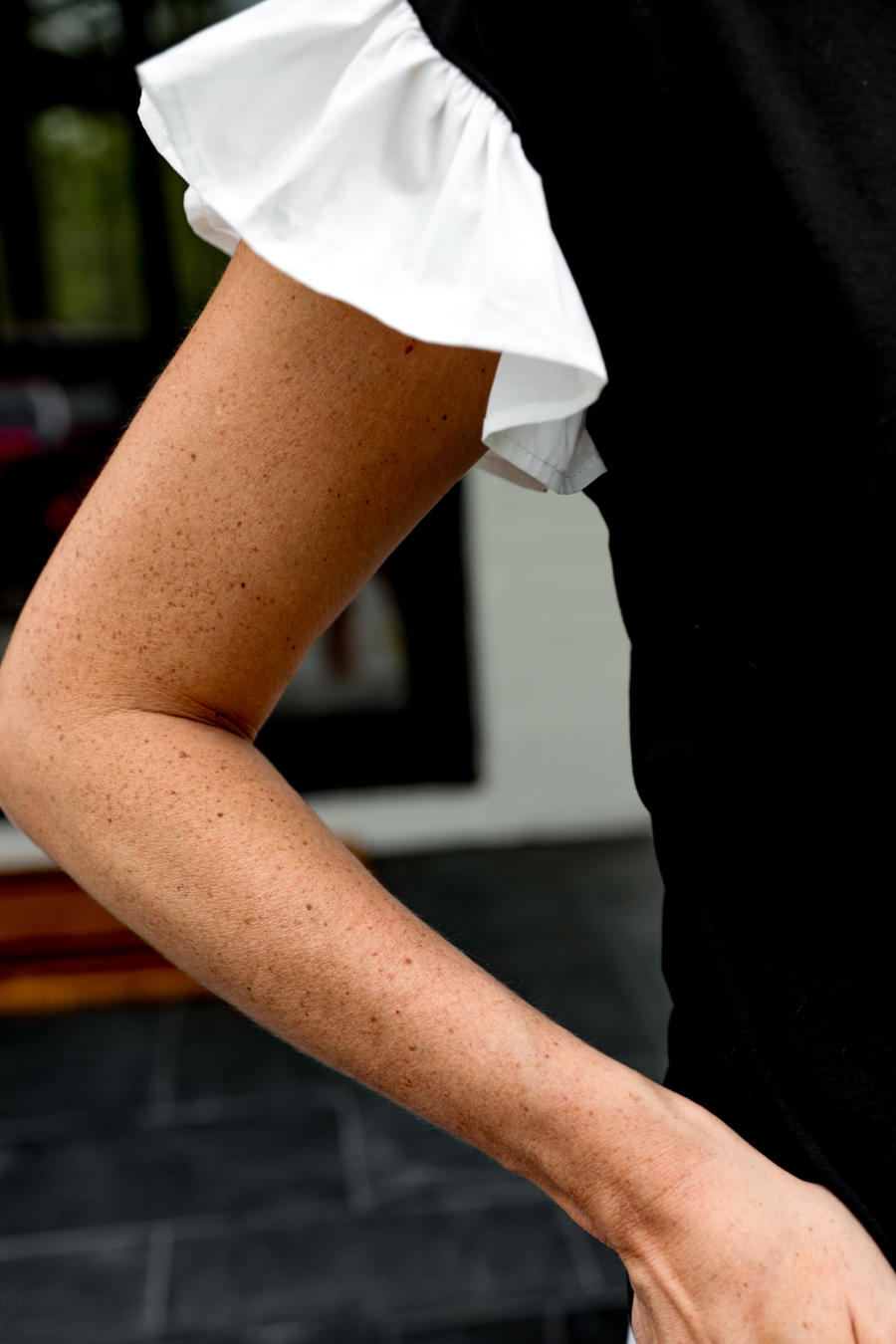 Womens black top with large white bow
